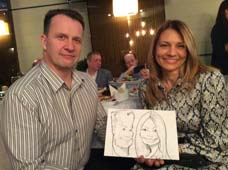 Евгений и Ольга позируют художнику на свадьбе в 